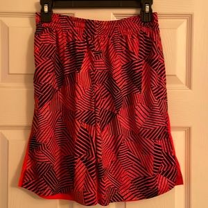 Boys orange and black shorts size 10/12 Husky
